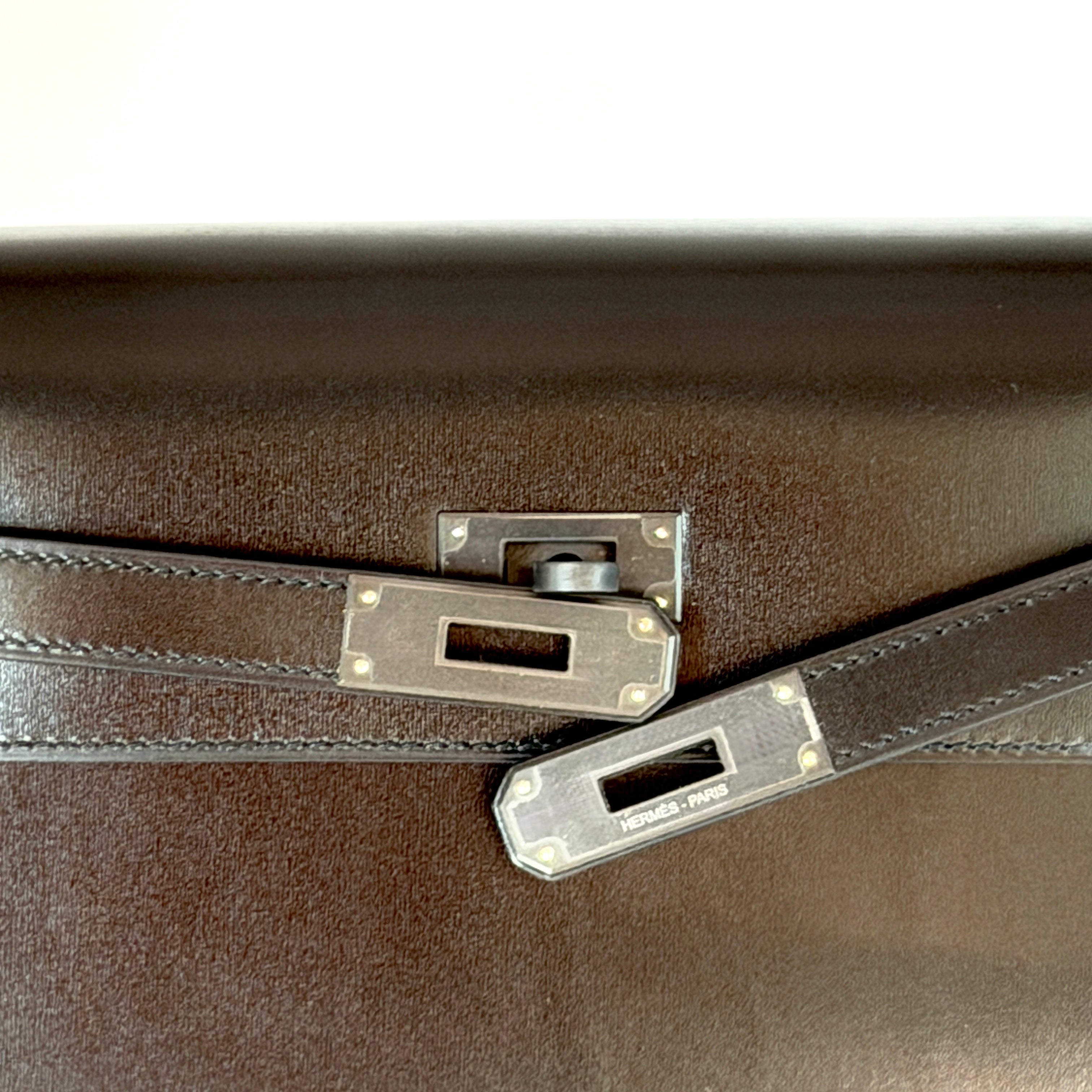 Hermès Kelly Depeches 25 Pouch Black Box Calfskin Black Monochrome PVD (Limited Edition)